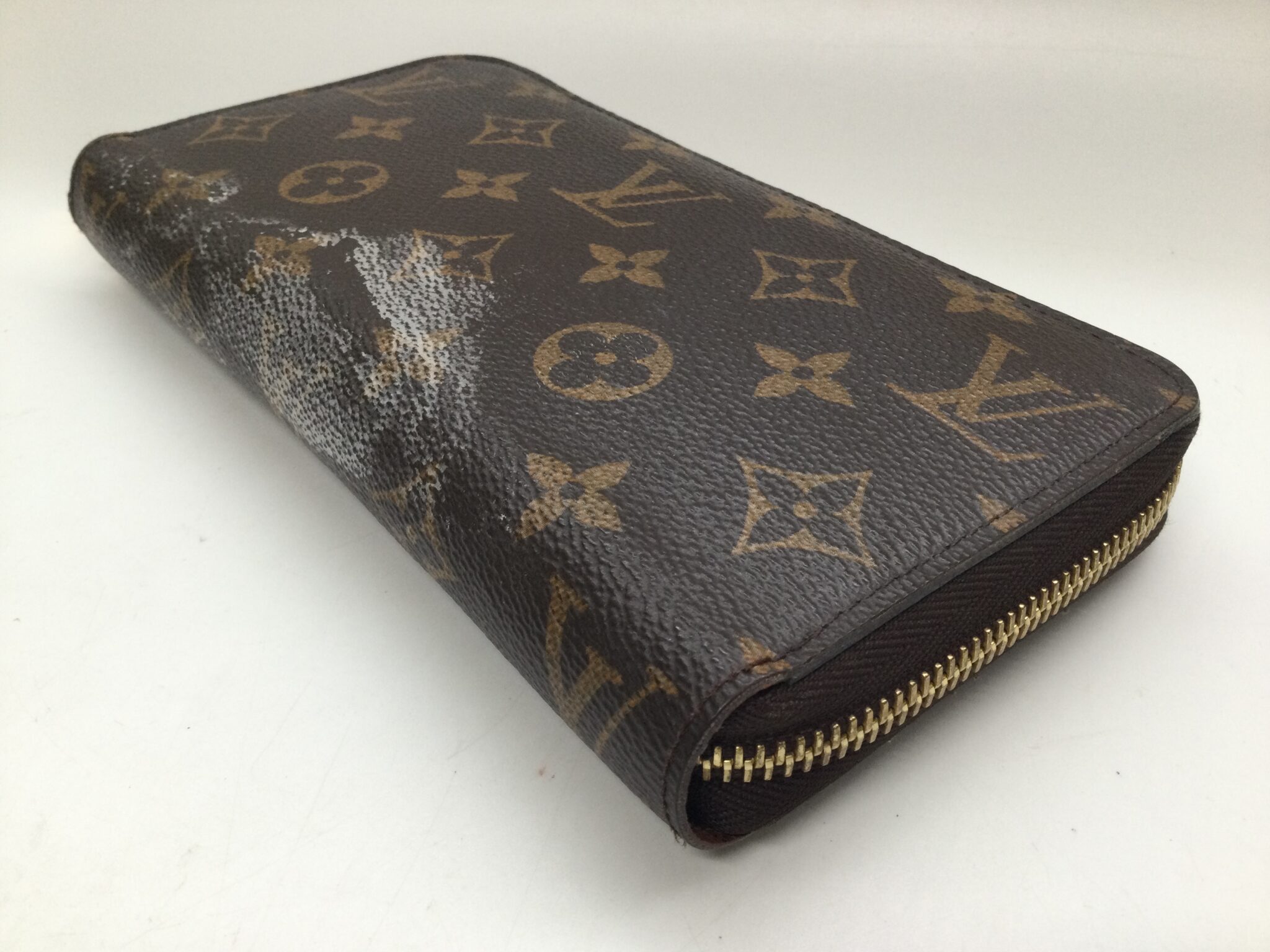 25-83 ルイヴィトン(Louis Vuitton)モノグラム財布　クレンジング